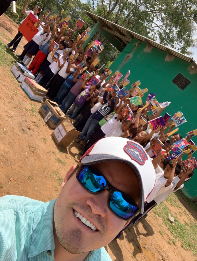 Juan helping deliver school supplies and other items in Honduras